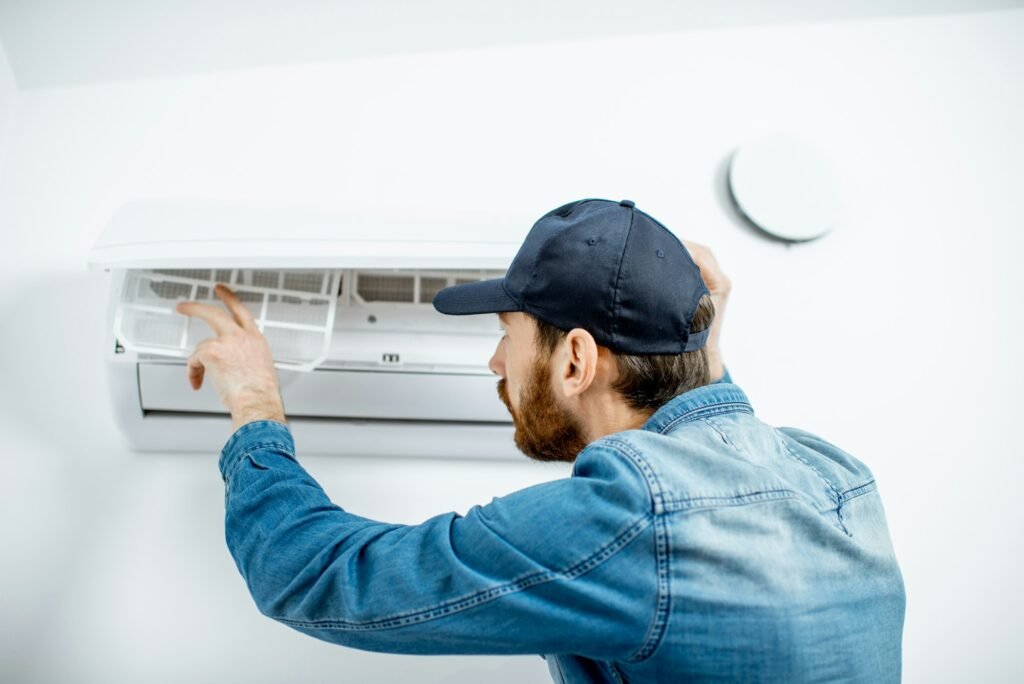 Man serving the air conditioner